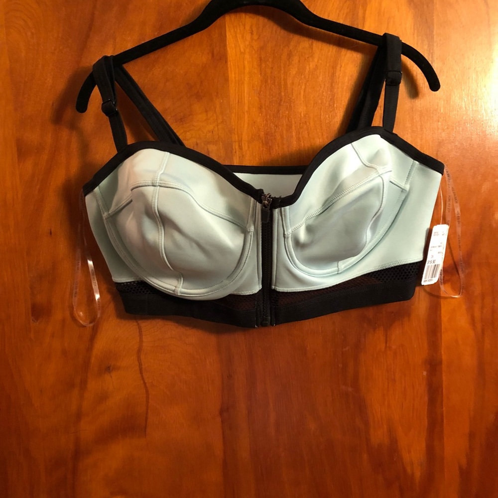 Robins egg blue swim suit with black mesh detail